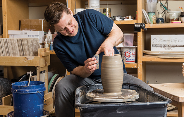 potter at the pottery wheel