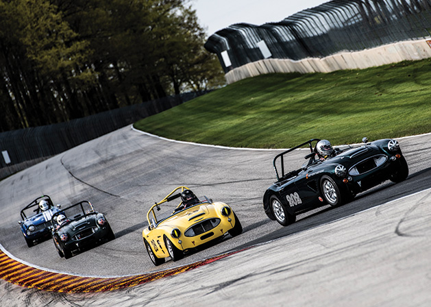 Racers drive classic cars at Road America.