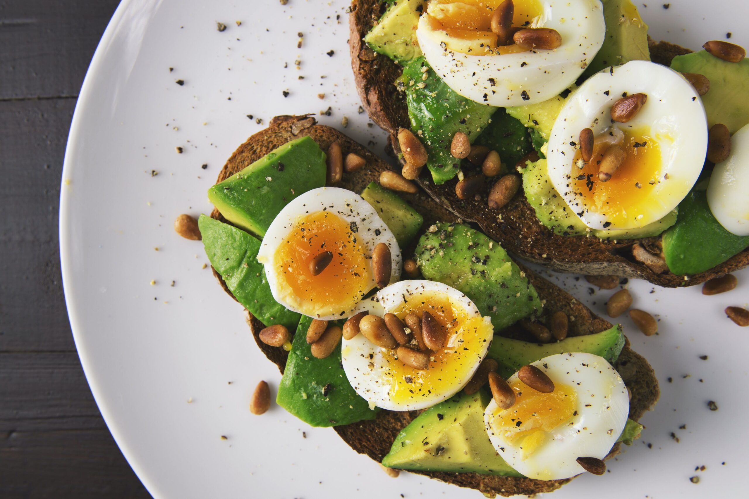 Start your day off right with a breakfast full of skin-boosting ingredients like egg and avocado. Pexels/Foodie Factor