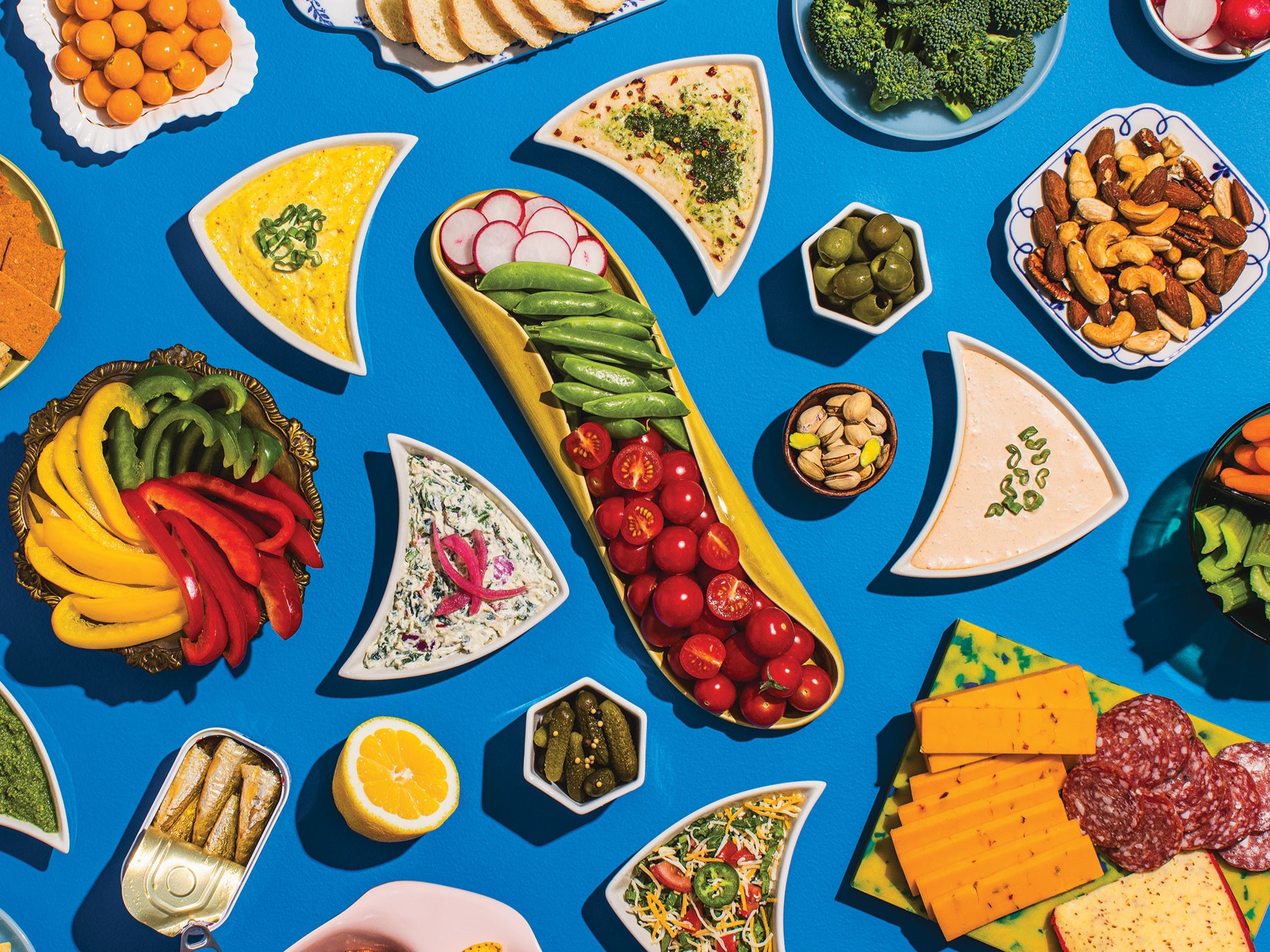 Spread of Summer Dips and Assorted Appetizers