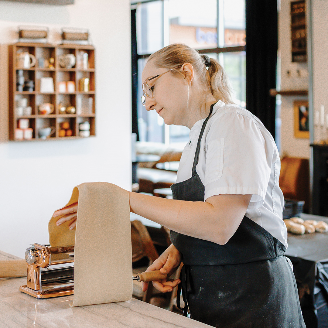 Chef Beth Wells rolling pasta dough.