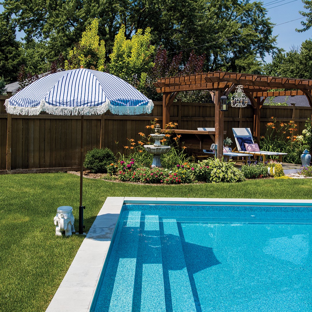 Andrea Soule’s layering design technique translates to the outdoors. Spring and summer in the backyard mean hardy perennials (boxwoods, grasses, hostas, hydrangeas, lilacs and lilies) and annuals (begonias, cosmos, impatiens, petunias, salvia, zinnias and more). The pool serves as a warm weather entertaining focal point. As the seasons flip, so does the family’s hosting venue, and the front yard turns into an outdoor ice skating rink that hosts its fair share of open skates and party takes. “I like it that way,” Soule says of her home’s ability to welcome guests at any time of year. 