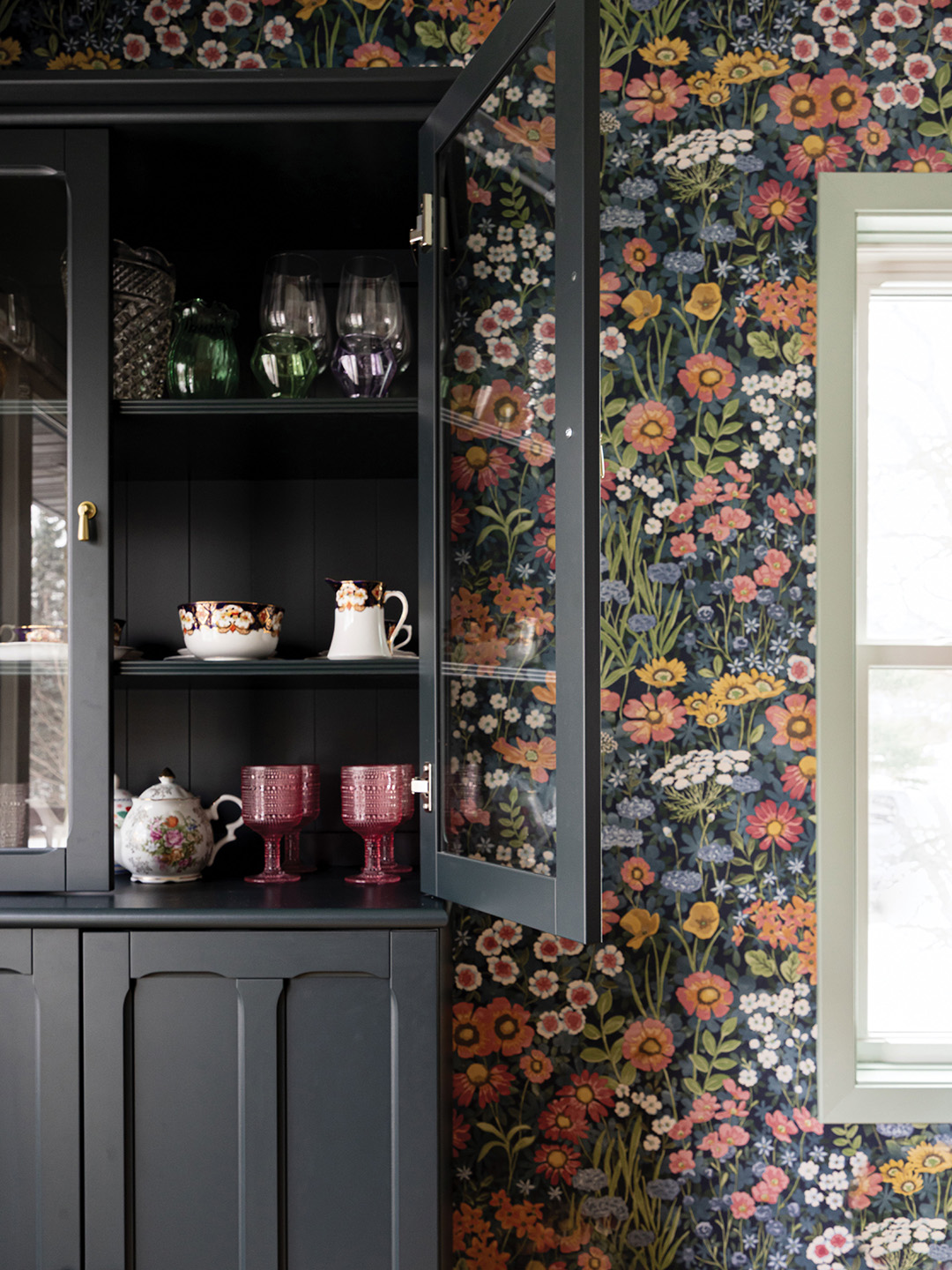 Dining room with modern floral wallpaper