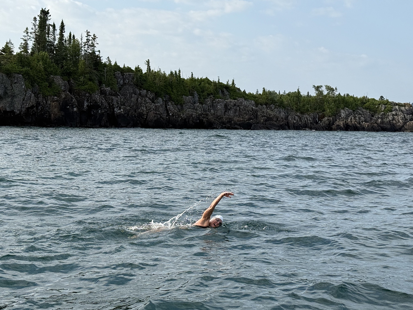 Karen Zemlin at the start of her swim with Isle Royale behind her.