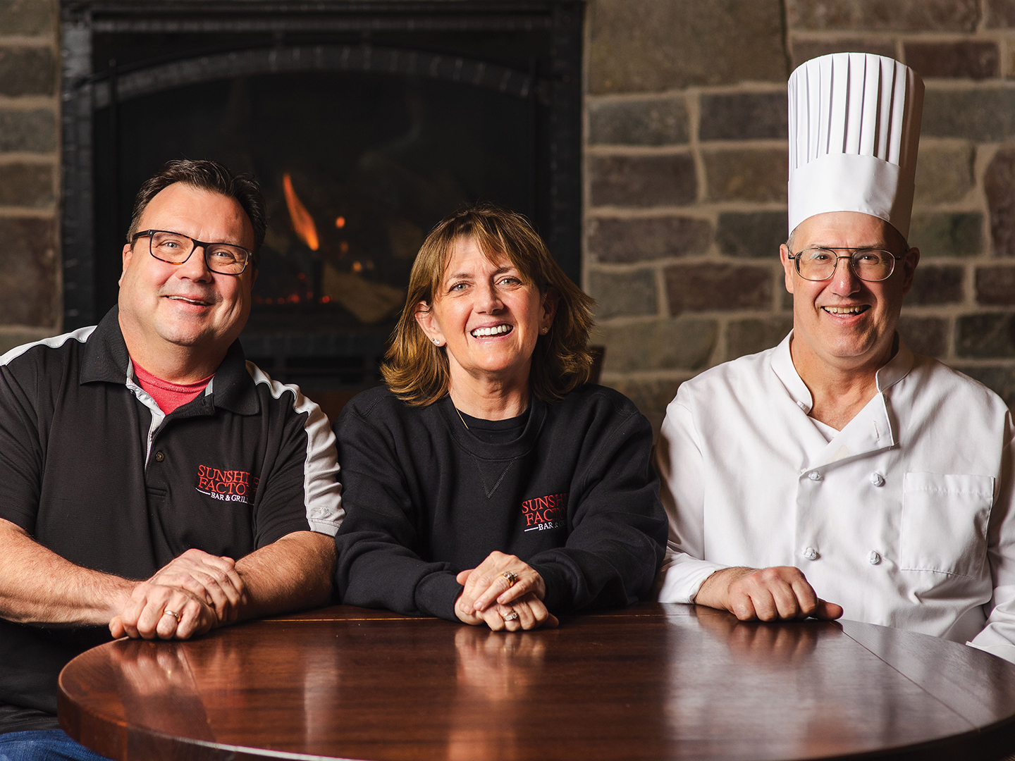 Brian and April Hanson alongside executive chef Andrew Ortis.