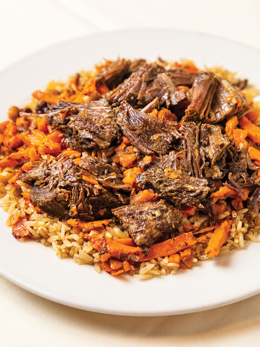 Plov is the national dish of Uzbekistan and consists of beef, carrots and a rice pilaf.