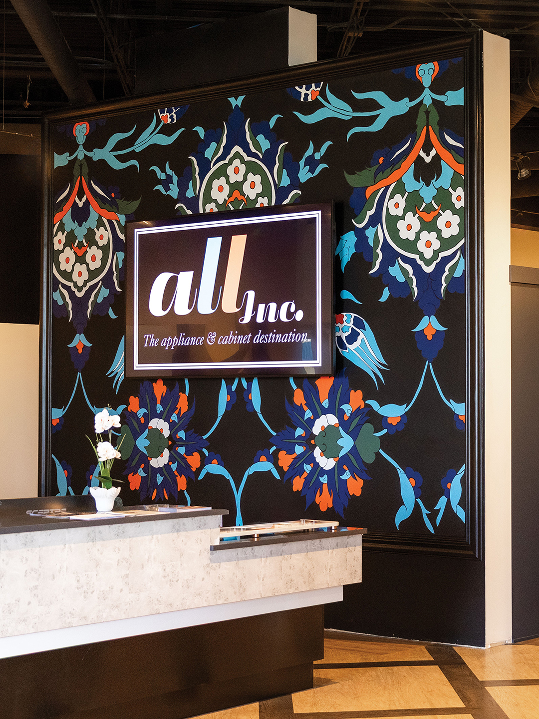 Seran Otterson transformed ALL, Inc.’s entryway and front desk with complementary Iznik pattern murals.